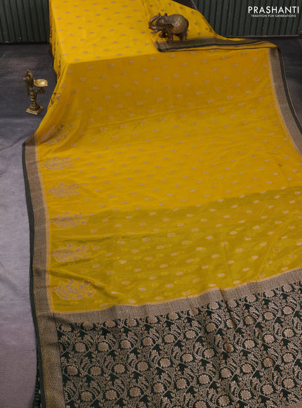 Banarasi semi crepe saree yellow and bottle green with allover thread & zari woven buttas and woven border