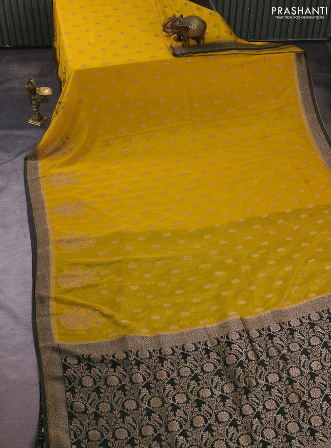 Banarasi semi crepe saree yellow and bottle green with allover thread & zari woven buttas and woven border