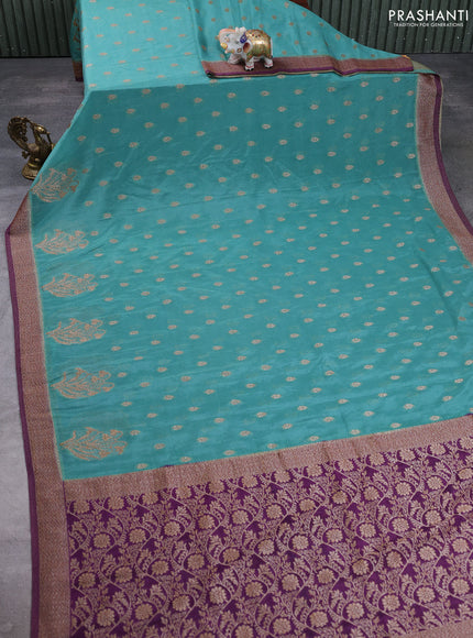 Banarasi semi crepe saree teal green shade and purple with allover thread & zari woven buttas and woven border