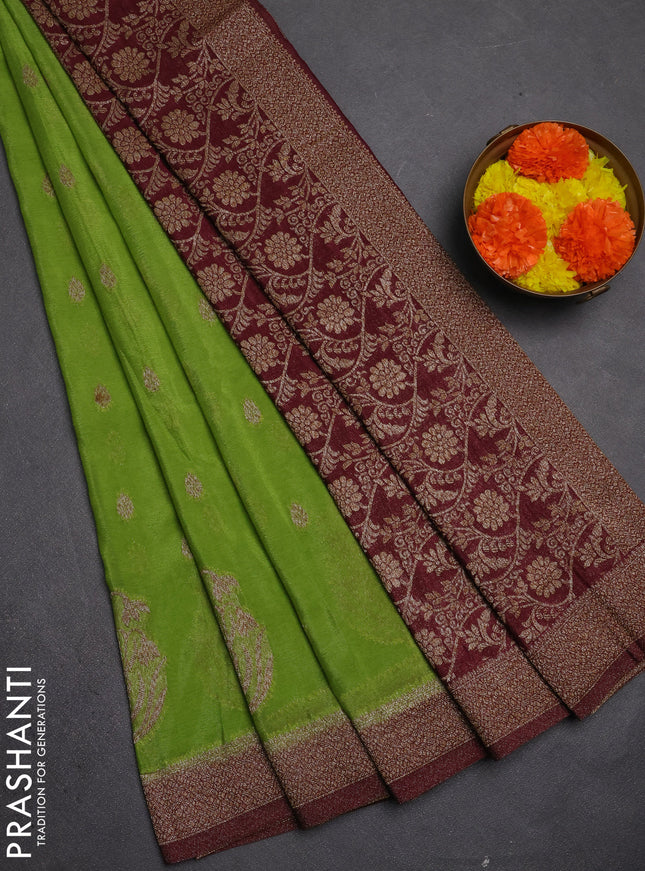 Banarasi semi crepe saree light green and deep maroon with allover thread & zari woven buttas and woven border