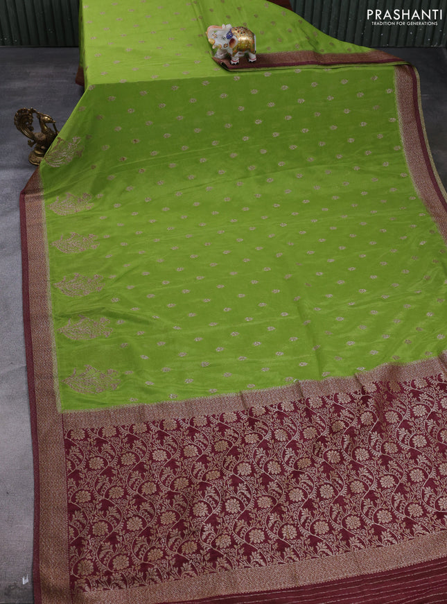 Banarasi semi crepe saree light green and deep maroon with allover thread & zari woven buttas and woven border