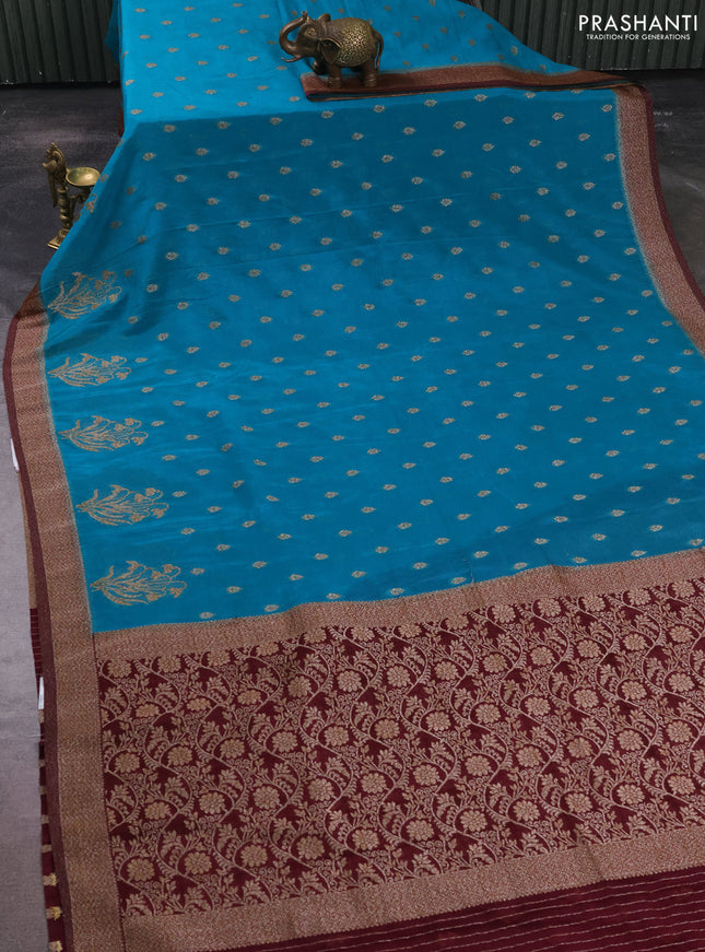 Banarasi semi crepe saree teal green and wine shade with allover thread & zari woven buttas and woven border