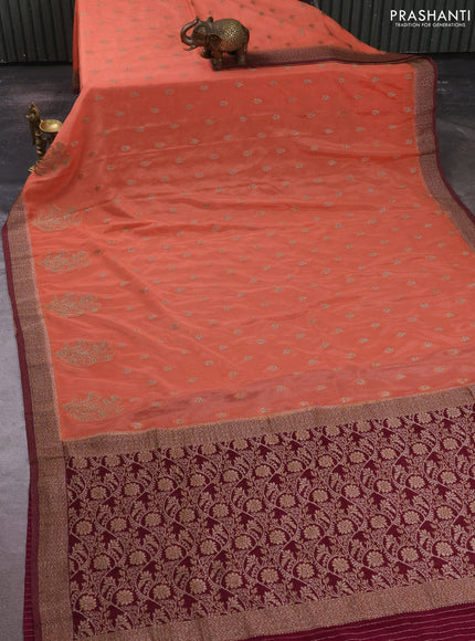 Banarasi semi crepe saree peach shade and wine shade with allover thread & zari woven buttas and woven border