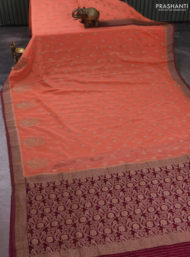 Banarasi semi crepe saree peach shade and wine shade with allover thread & zari woven buttas and woven border