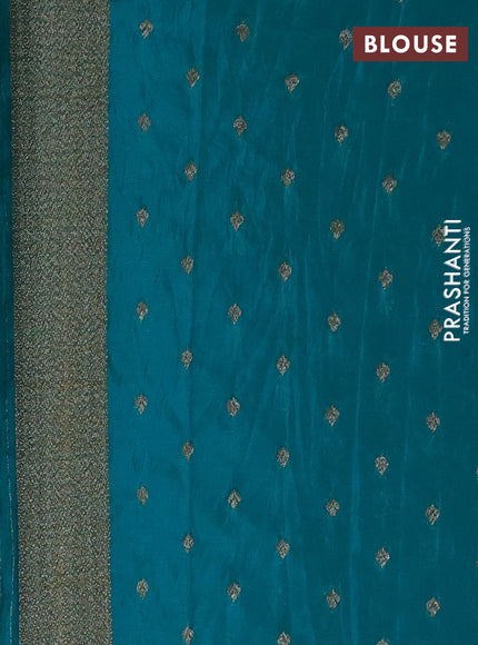 Banarasi semi crepe saree teal green with allover thread & zari woven buttas and woven border