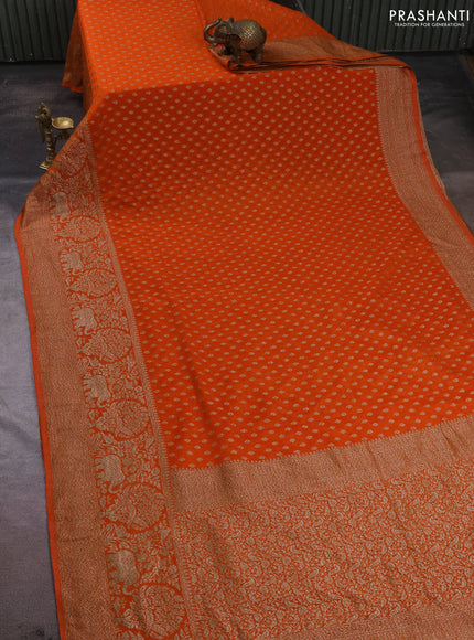 Banarasi semi crepe saree orange with allover thread & zari woven buttas and long woven border