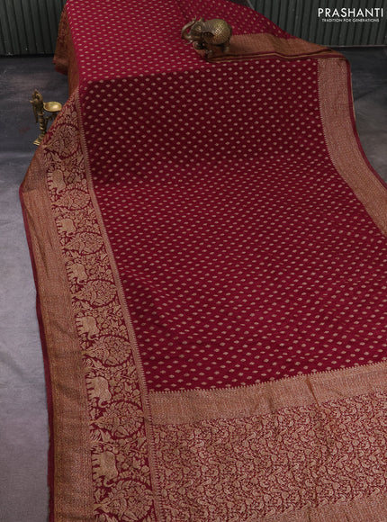 Banarasi semi crepe saree deep wine with allover thread & zari woven buttas and long woven border