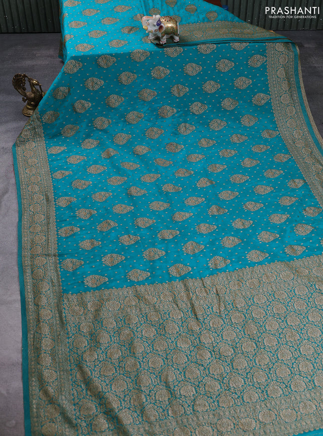 Banarasi semi crepe saree teal green with allover thread & zari woven buttas and woven border