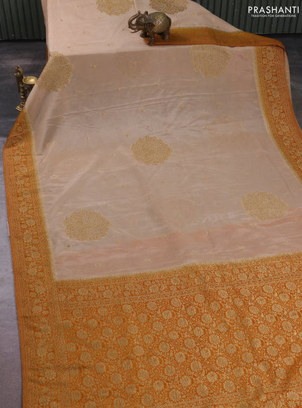 Banarasi semi crepe saree beige and dark mustard with allover thread & zari woven buttas and woven border