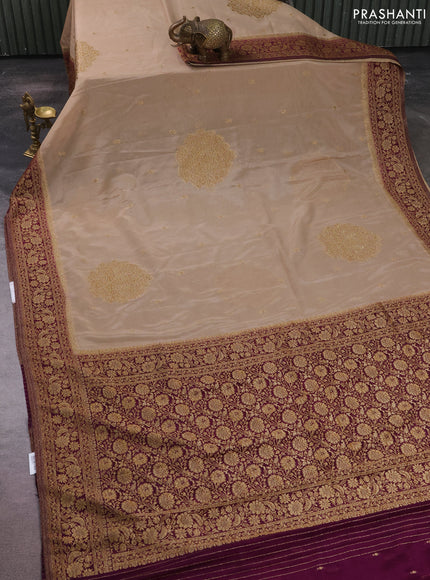 Banarasi semi crepe saree beige and deep purple with allover thread & zari woven buttas and woven border