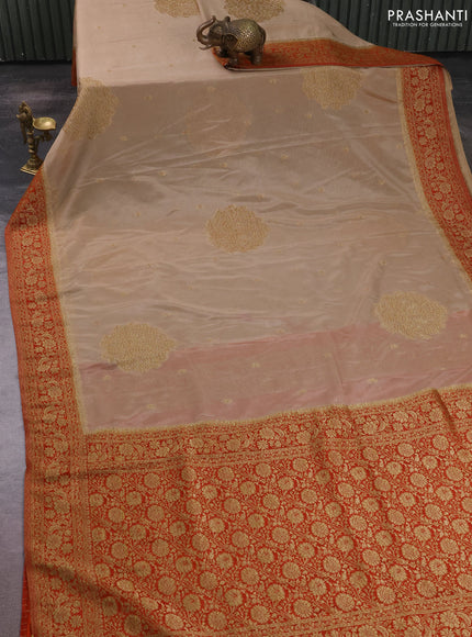 Banarasi semi crepe saree beige and rustic orange with allover thread & zari woven buttas and woven border
