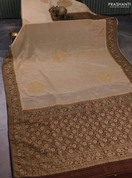 Banarasi semi crepe saree beige and coffee brown with allover thread & zari woven buttas and woven border