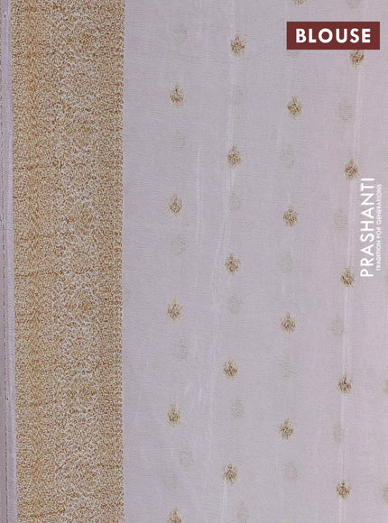 Banarasi semi crepe saree orange and off white with allover woven checks & buttas and woven border