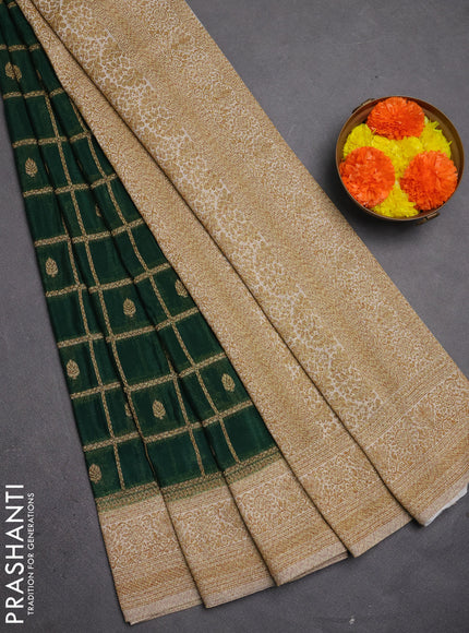 Banarasi semi crepe saree bottle green and off white with allover woven checks & buttas and woven border