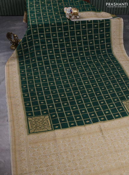 Banarasi semi crepe saree bottle green and off white with allover woven checks & buttas and woven border