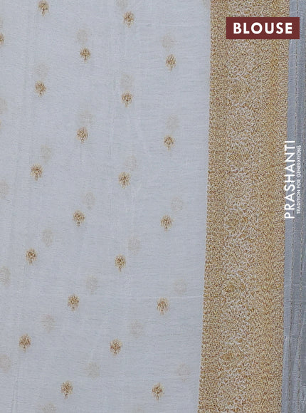 Banarasi semi crepe saree bottle green and off white with allover woven checks & buttas and woven border