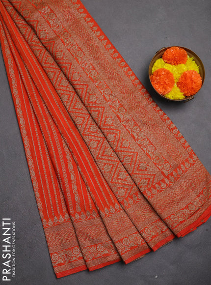 Banarasi semi crepe saree orange with allover thread & zari weaves and woven border