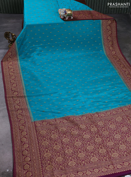 Banarasi semi crepe saree teal blue and wine shade with allover thread & zari woven buttas and woven border