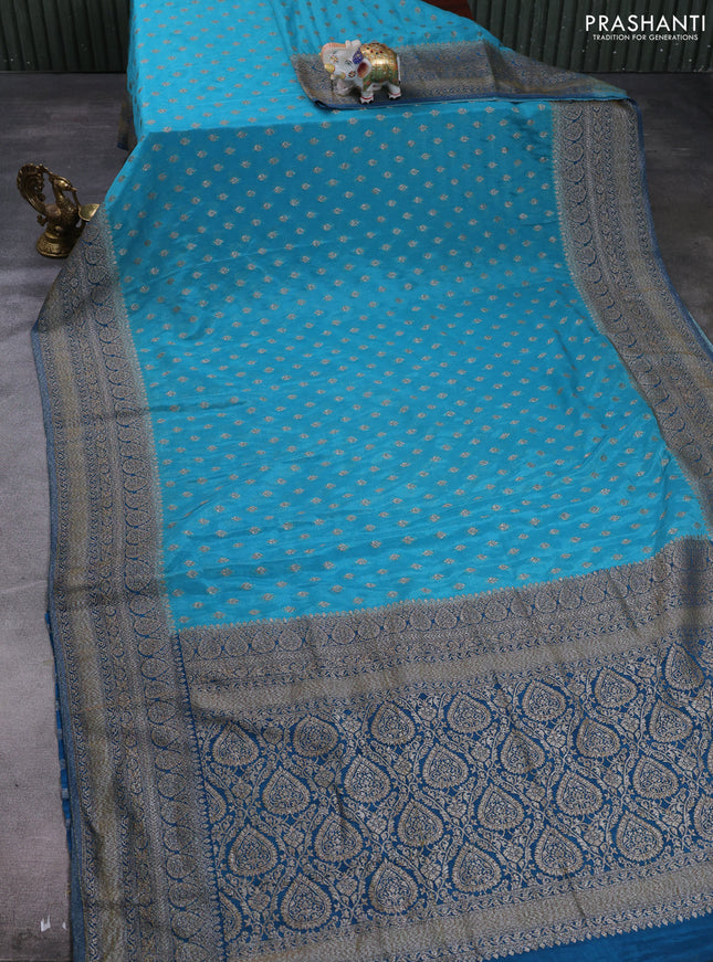 Banarasi semi crepe saree teal blue and peacock blue with allover thread & zari woven buttas and woven border