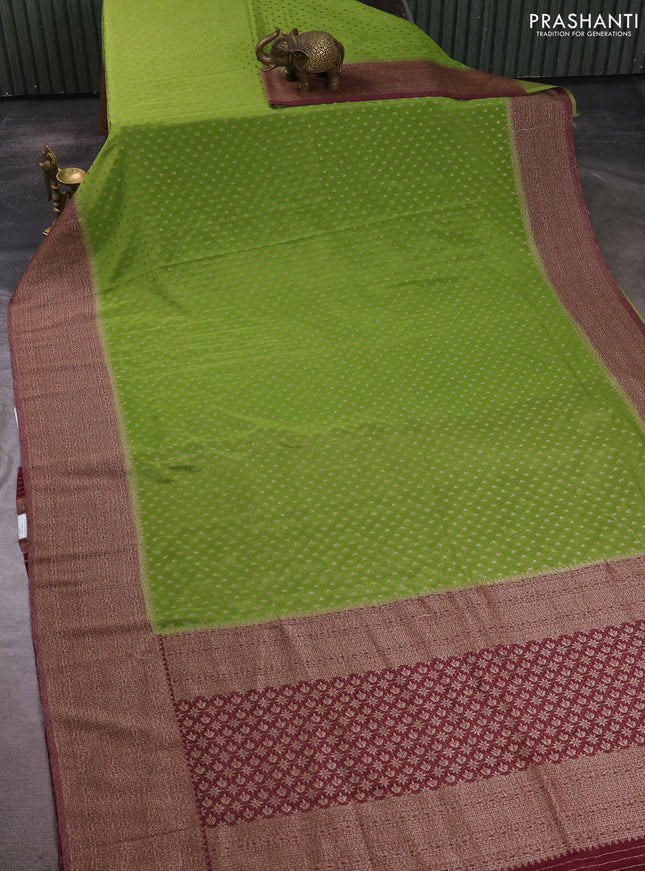 Banarasi semi crepe saree light green and deep maroon with allover thread & zari woven buttas and long woven border