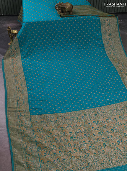 Banarasi semi crepe saree teal green with allover thread & zari woven buttas and woven border