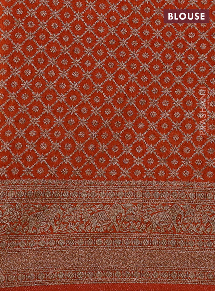 Banarasi semi crepe saree orange with allover thread & zari woven buttas and woven border