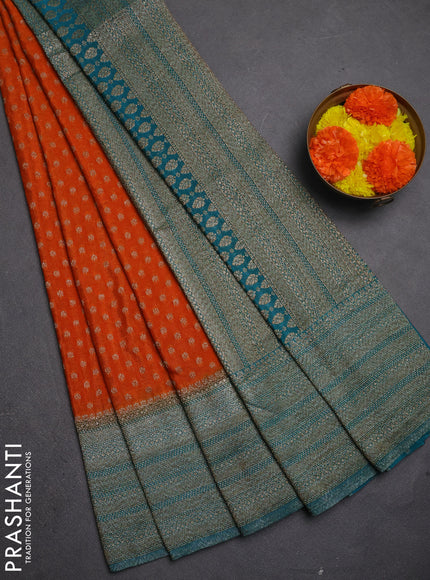 Banarasi semi crepe saree orange and teal green with allover thread & zari woven buttas and long woven border
