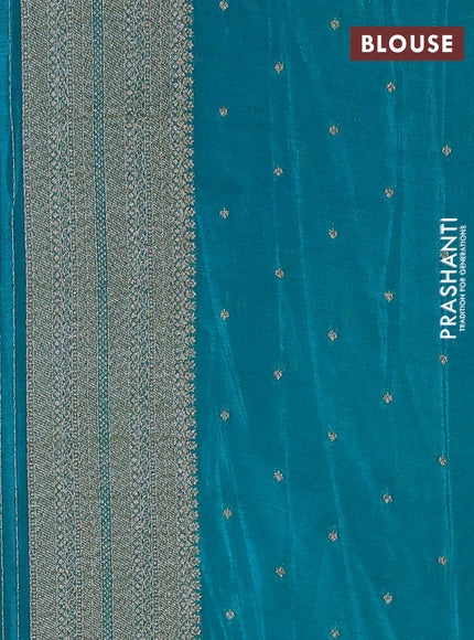 Banarasi semi crepe saree black and teal green with allover thread & zari woven buttas and long woven border
