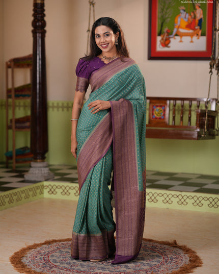 Banarasi semi crepe saree pastel green and purple with allover thread & zari woven buttas and long woven border