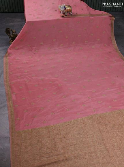 Banarasi semi crepe saree peach shade with allover thread & zari woven buttas and woven border