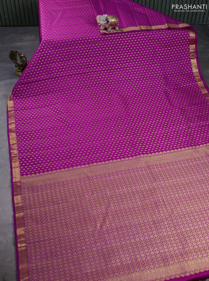 Pure kanchipuram silk saree magenta pink with allover zari woven small buttas and zari woven border