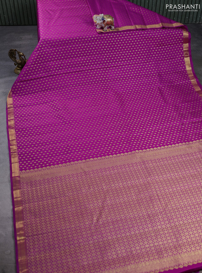 Pure kanchipuram silk saree magenta pink with allover zari woven small buttas and zari woven border