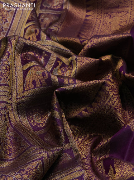 Pure kanchipuram silk saree deep purple with allover zari woven brocade weaves and zari woven pichwai butta border