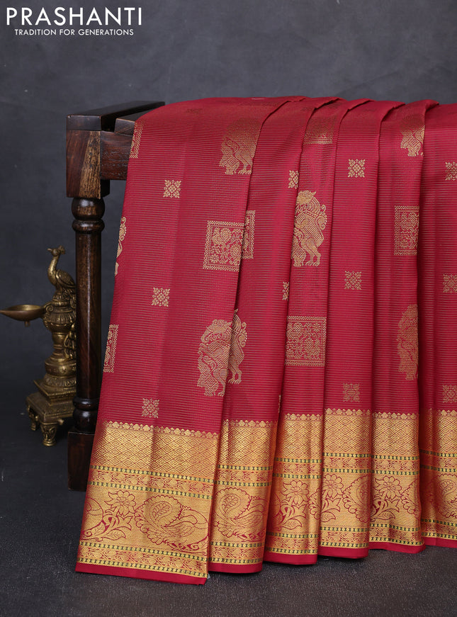 Pure kanchipuram silk saree maroon with allover vairaosi pattern & peacock zari buttas and rich zari woven border