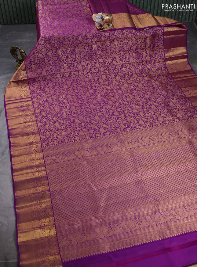 Pure kanchipuram silk saree purple with allover zari woven brocade weaves and long rich zari woven border