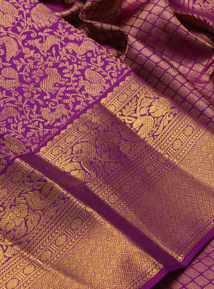 Pure kanchipuram silk saree purple with allover zari woven brocade weaves and long rich zari woven border