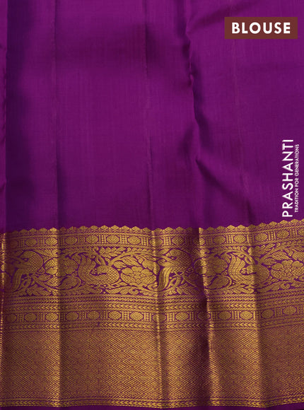 Pure kanchipuram silk saree purple with allover zari woven brocade weaves and long rich zari woven border