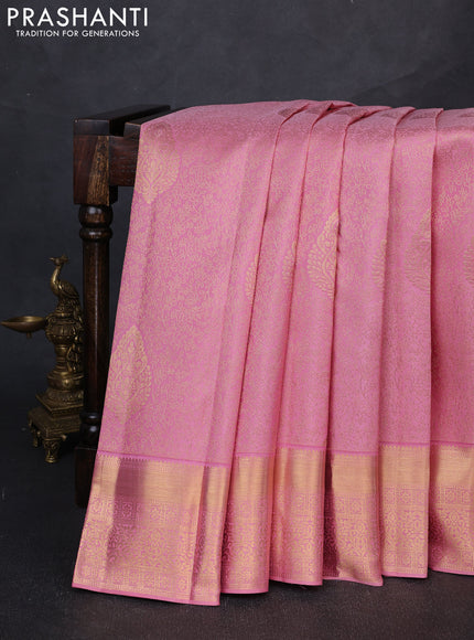 Pure kanchipuram silk saree peach with allover zari woven brocade weaves and rich zari woven border