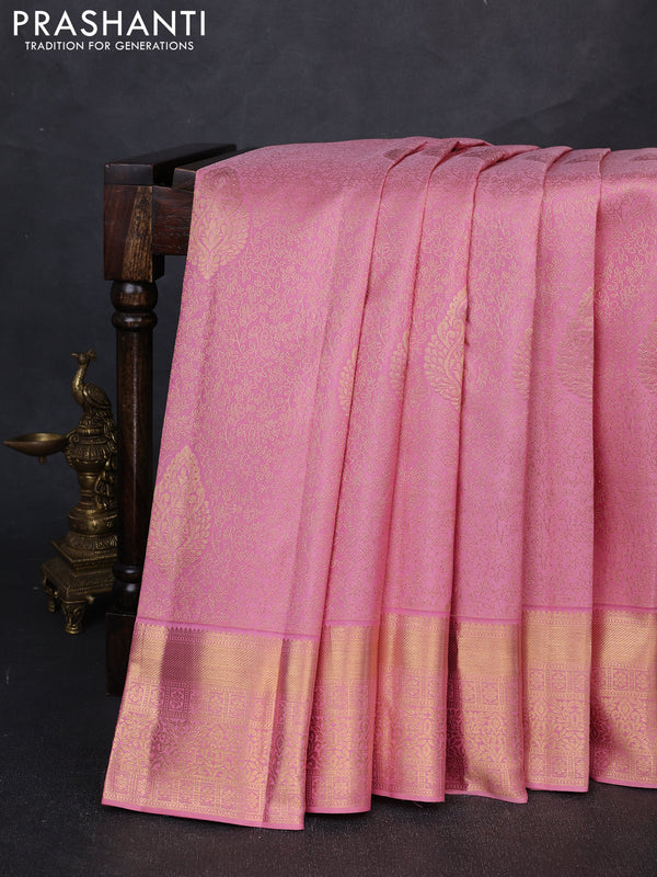 Pure kanchipuram silk saree peach with allover zari woven brocade weaves and rich zari woven border