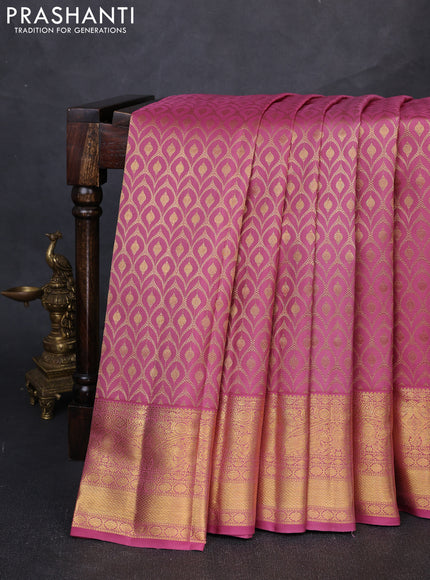 Pure kanchipuram silk saree mauve pink with allover zari woven brocade weaves and rich zari woven border