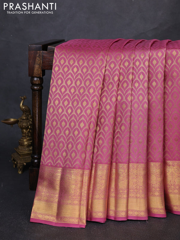 Pure kanchipuram silk saree mauve pink with allover zari woven brocade weaves and rich zari woven border