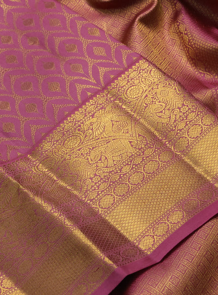 Pure kanchipuram silk saree mauve pink with allover zari woven brocade weaves and rich zari woven border