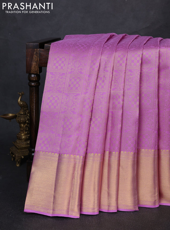 Pure kanchipuram silk saree lavender with allover zari woven brocade weaves and long rich zari woven border