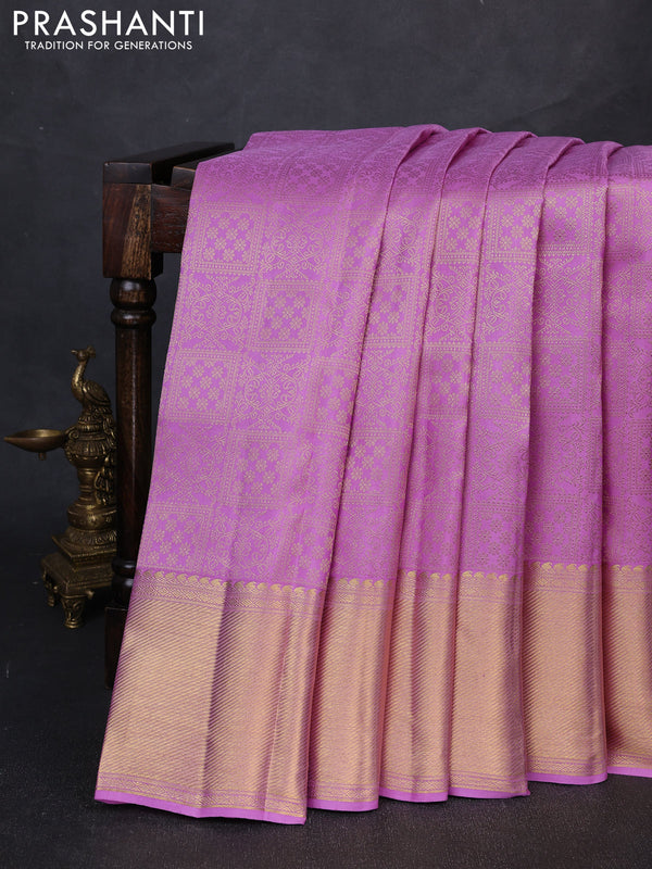 Pure kanchipuram silk saree lavender with allover zari woven brocade weaves and long rich zari woven border