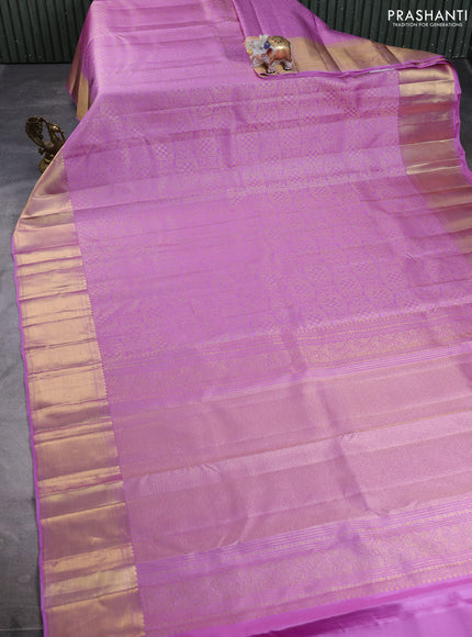 Pure kanchipuram silk saree lavender with allover zari woven brocade weaves and long rich zari woven border