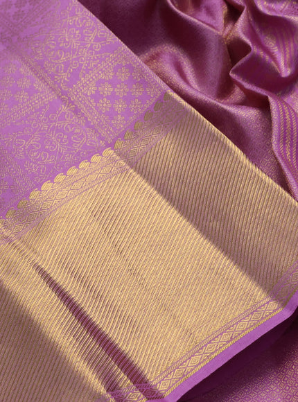 Pure kanchipuram silk saree lavender with allover zari woven brocade weaves and long rich zari woven border