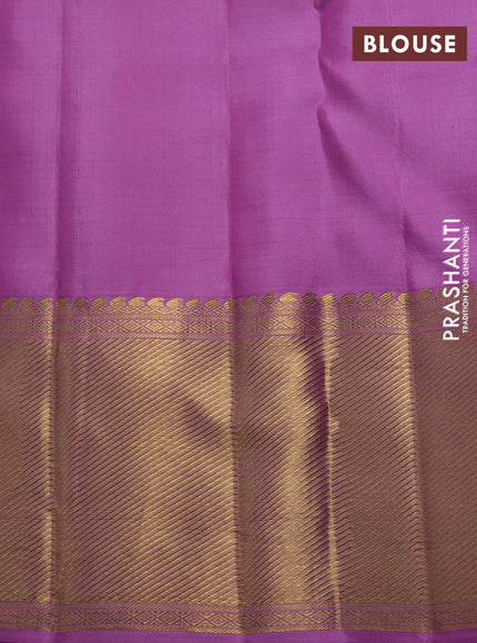 Pure kanchipuram silk saree lavender with allover zari woven brocade weaves and long rich zari woven border