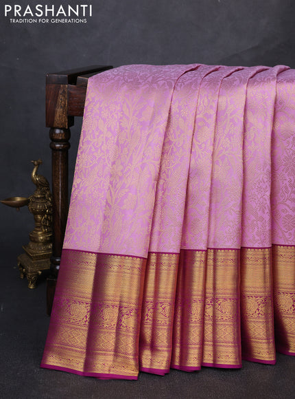Pure kanchipuram silk saree mild lavender and purple with allover zari woven brocade weaves and long rich zari woven border
