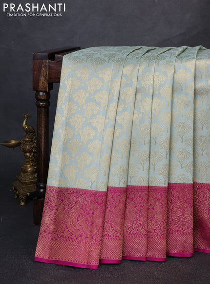 Pure kanchipuram silk saree pastel blue and purple with allover zari woven brocade weaves and long rich zari woven annam border