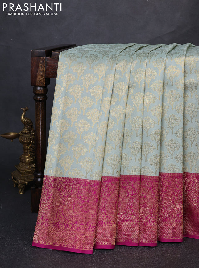 Pure kanchipuram silk saree pastel blue and purple with allover zari woven brocade weaves and long rich zari woven annam border